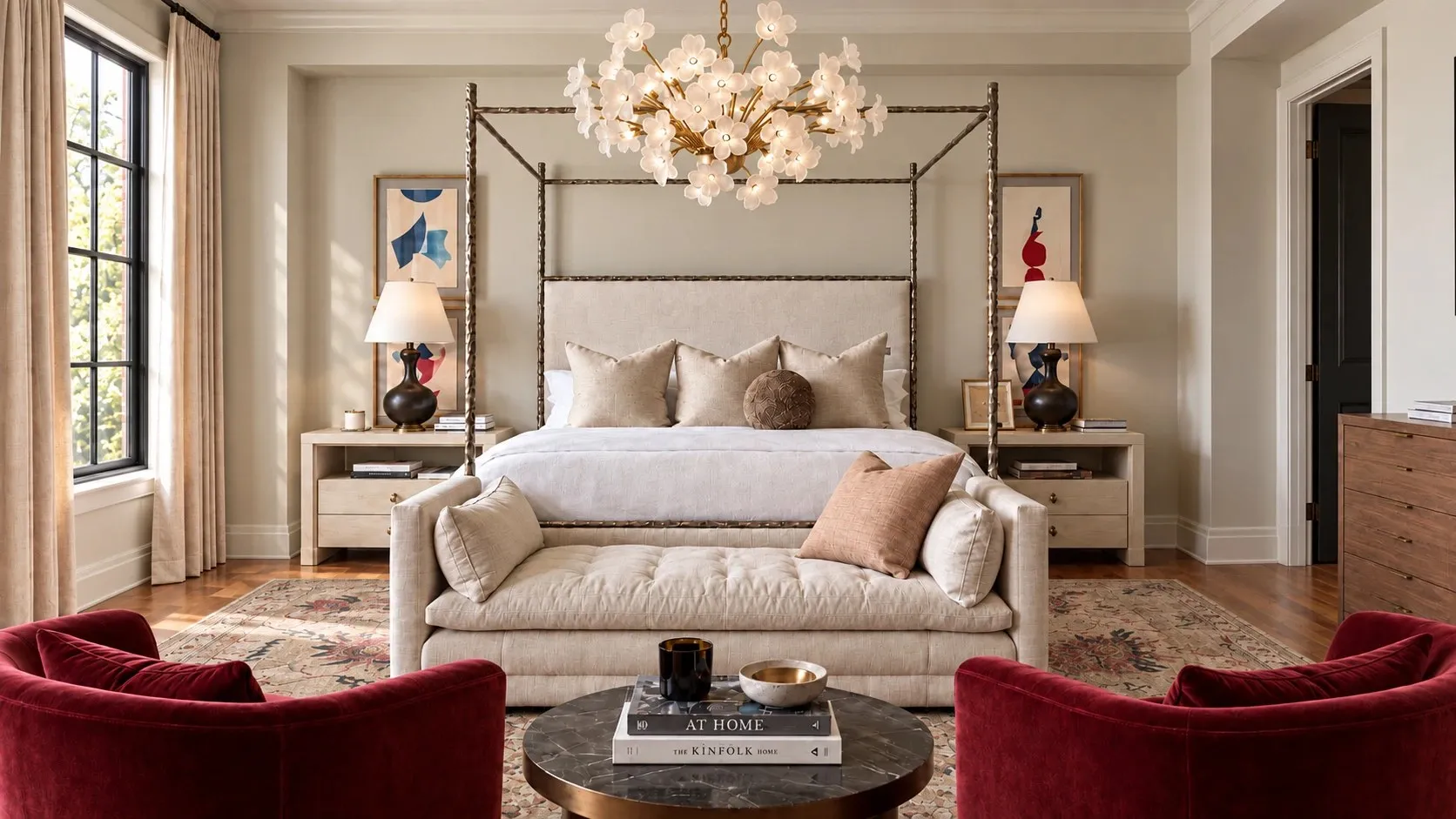 Primary bedroom with a hammered-metal canopy bed and floral chandelier.